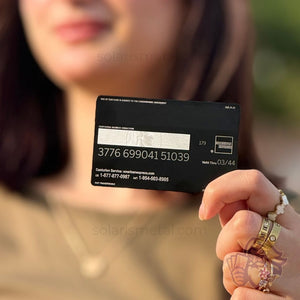 Matte-black American Express–design Solaris metal card, back view