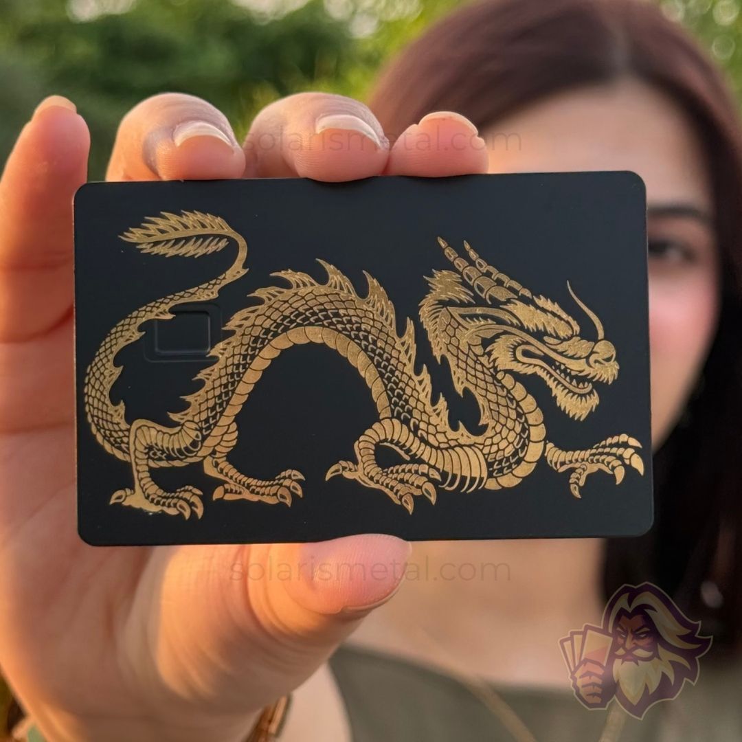 Solaris metal card with an engraved dragon design, front view