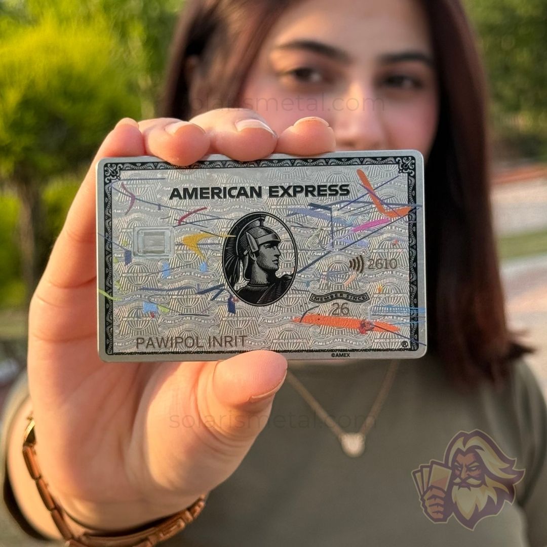 Platinum-finish Solaris metal card with custom art engraving, front view
